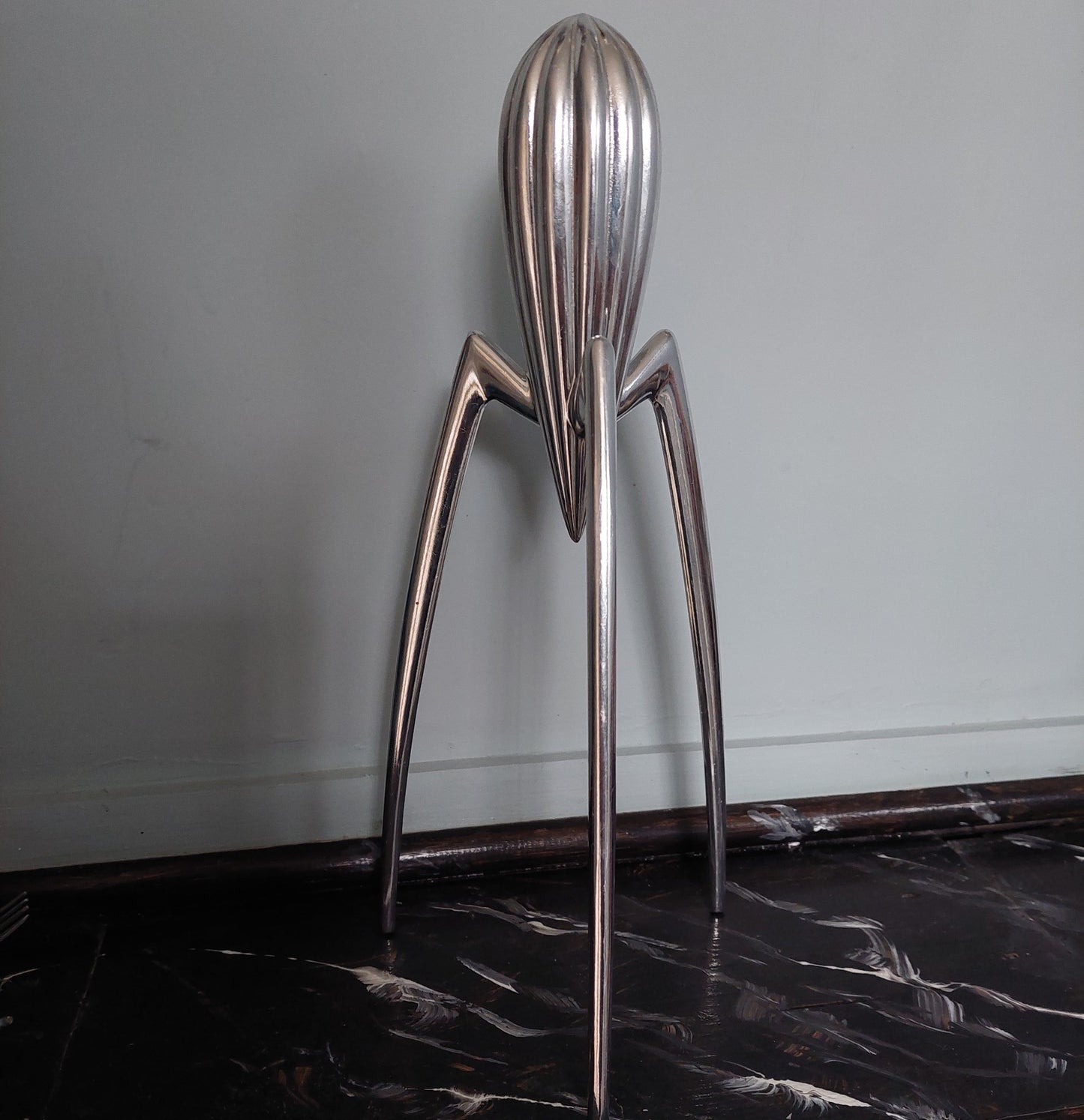 lemon squeezer on marble shelf