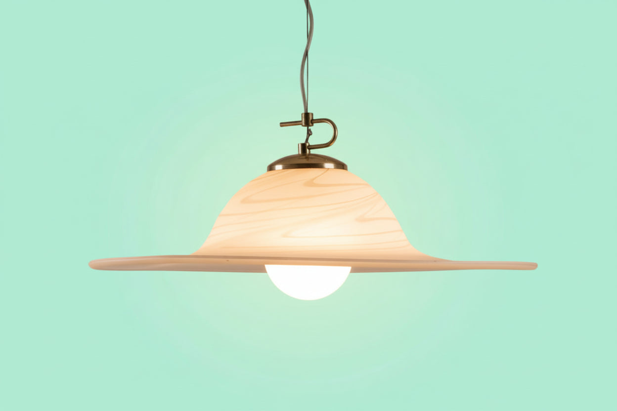 Pendant light fixture on a solid background